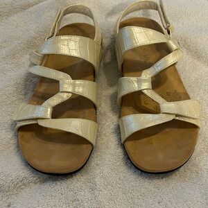 Vionic sandals. Beige cream color shiny Velcro straps. Size 8. Used a few times